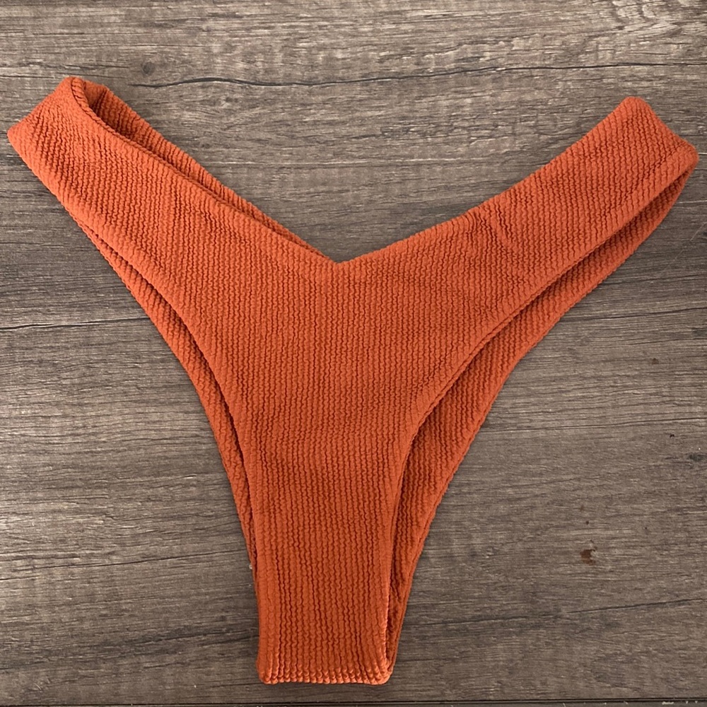 Terracotta crinkle medium bikini bottom by Koana Swim. Never worn